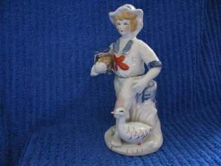 Фарфоровая статуэтка "Мальчик с гусем" из Германии