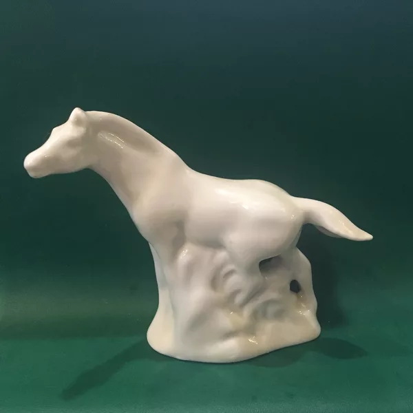 Конь